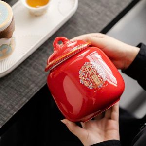 Hũ sứ đỏ đựng trà dáng chum